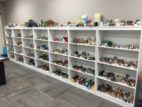 10 Categories for Sorting Sand Tray Miniatures on Shelves